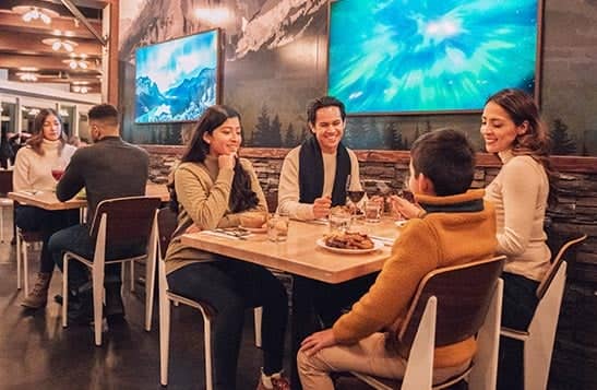 A family sat for dinner in a restaurant dining room.