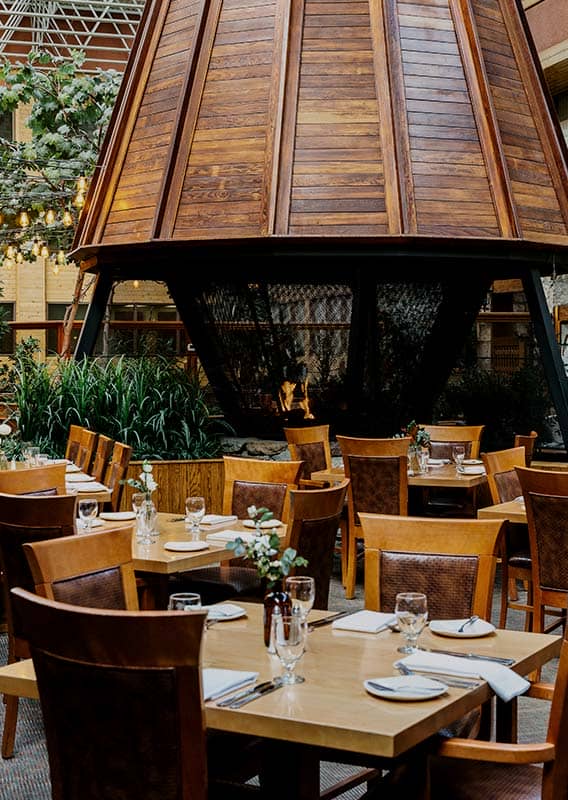 Tables set out for dining at a restaurant