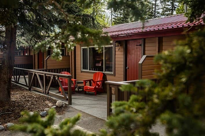 The exterior of a wooden motel-style building