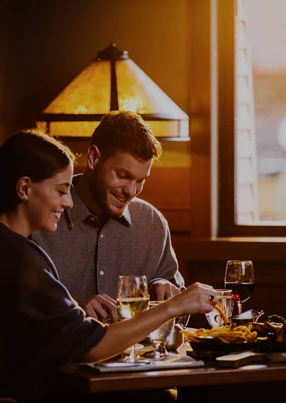 Embers Steakhouse set against a background of Pyramid Mountain