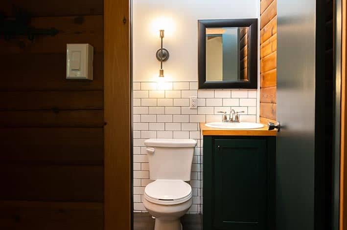 A bathroom with white tile