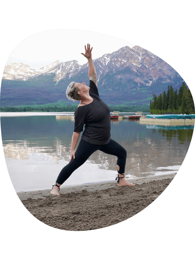 A yoga instructor on the beach.